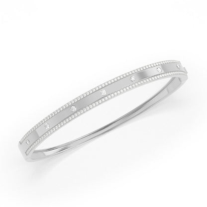 Luxurious flush-set diamond bangle with Pave edges